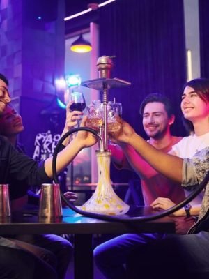 smoking-hookah-group-friends-having-fun-night-club-together_146671-69292